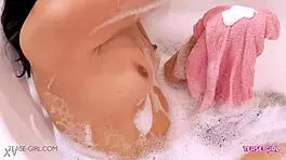 Sexy brunette teen bathes slowly revealing her perfect body curves