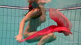 silvie dives in pool showing off her big tits and hairy pussy