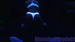 Scarlett Johnson glows under blacklight in mysterious solo tease