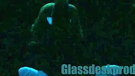 Scarlett Johnson glows under blacklight in mysterious solo tease