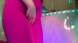 Hey, watch this horny bbw squirt hard fingering wet pussy through pink leggings up close!