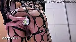 shemale pushes extreme anal dildo into narrow ass cage