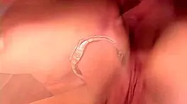 Dark-haired beauty double-teamed hard in intense anal threesome