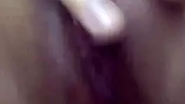 Young cutie fingers her dripping wet pussy in solo tease