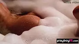 Diana Lark strips in bubbly bath