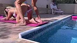 Woman Bent Over Poolside in Steamy Outdoor Encounter