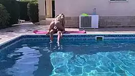 Woman Bent Over Poolside in Steamy Outdoor Encounter