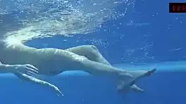 brunette babe mia ferrari dives into tight pool swimsuit tease