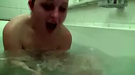 shy angela fingers shaved pussy in steamy bath solo