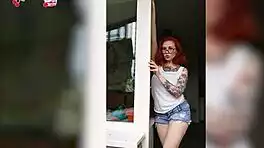 hey watch this sexy redhead babe in wet t-shirt cleaning