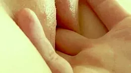 Wet pussy fingering builds to explosive squirting orgasm