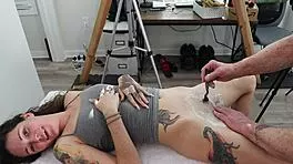 check out this sexy brunette getting shaved then pounded backstage