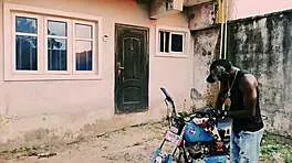 Petite biker babe stands on bike taking hard public garage fuck from man!