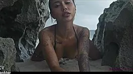 Skinny asian babe fingers herself nude on crowded beach