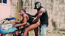 Petite biker babe stands on bike taking hard public garage fuck from man!