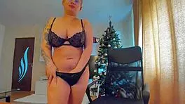 Black lingerie busty blonde teases huge natural tits on webcam