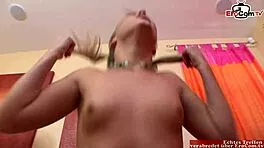 flexible blonde cheerleader teen flaunts small tits in miniskirt