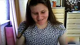 brunette girl next door in skirt and socks masturbates on video chat