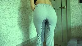 desperate pee drenches sweatpants in kinky thrill