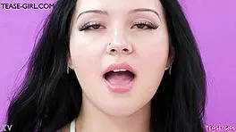 elegant brunette teases on sofa during intimate photoshoot