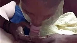 black beauty sucks white cock deep then squeezes it between perfect big tits