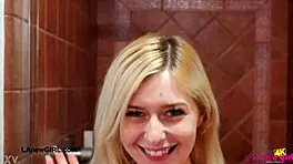 sun kissed blonde model strips in steamy shower session