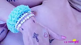 Petite blonde milf strips naked for close-up sofa massage tease