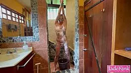 submissive slut bound in bathroom takes rough foam punishment