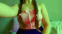 Hey check out this horny student masturbating messily with her wet skirt up