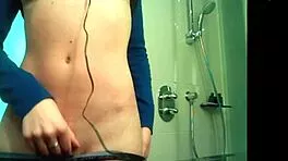 Cute Babe Teases Undress in Steamy Bath