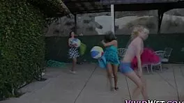 tribbing lesbians grind wet pussies outdoors in bikinis