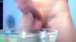 Hung Shemale Masturbates and Squirts Huge Load into Bowl