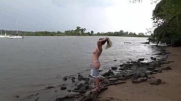 sexy blonde teen 18+ strips nude on public beach. she masturbates openly outdoors.