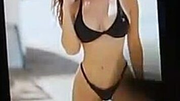 Man jerks off cock and watches porn and cums - slow motion