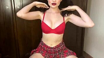 Teen brunette strips with a teasing flair in a captivating display.