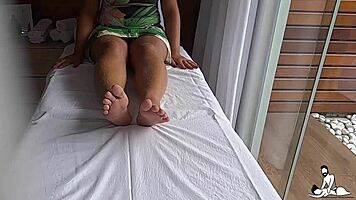 Young latina girl gets a tantric massage on the therapist's table