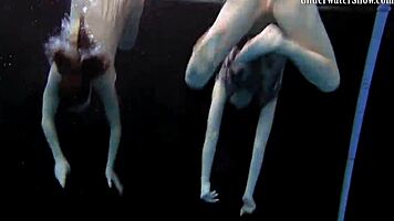 Two Girls Swim and Get Naked on Beach