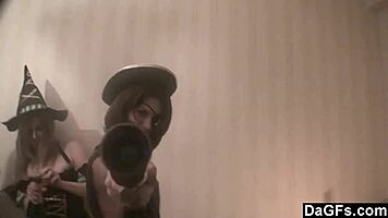 three costumed lesbians enjoy halloween party fun