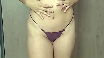 Watch This Sexy Brunette Slut Rip Off Her Red Lingerie And Show Natural Tits!