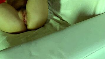 look at these petite blonde's feet in red stockings stroking that big black cock