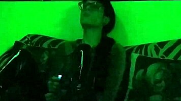 beth kinky goth mistress smokes in green light hd