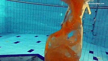 Nastya strips clothes and shows body in pool
