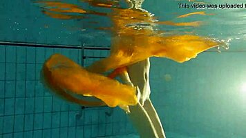 Nastya strips clothes and shows body in pool