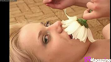 ana fey explores petals in her undergarments during a nature ritual