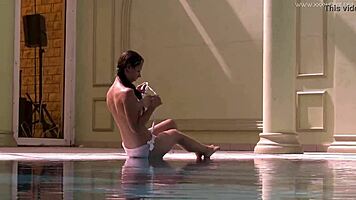 stefanie moon and vyvan hill splashing underwater in pool