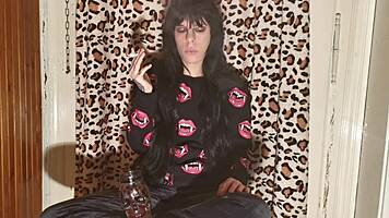 Goth Girl Smokes Cigarette Backstage After Long Day In HD