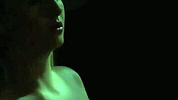 in the dungeon, a mistress whips and humiliates her bound submissive teen companion