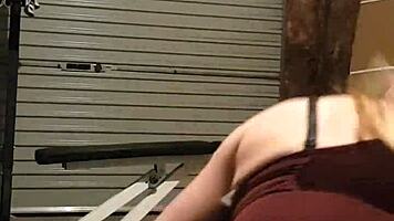 Gym Girl Teases with Sultry Striptease Moves