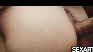 gorgeous brunette plays sexy kissing game on sofa