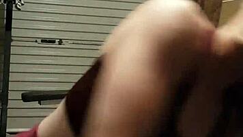 Muscular blonde milf teases in gym, undressing leggings for striptease